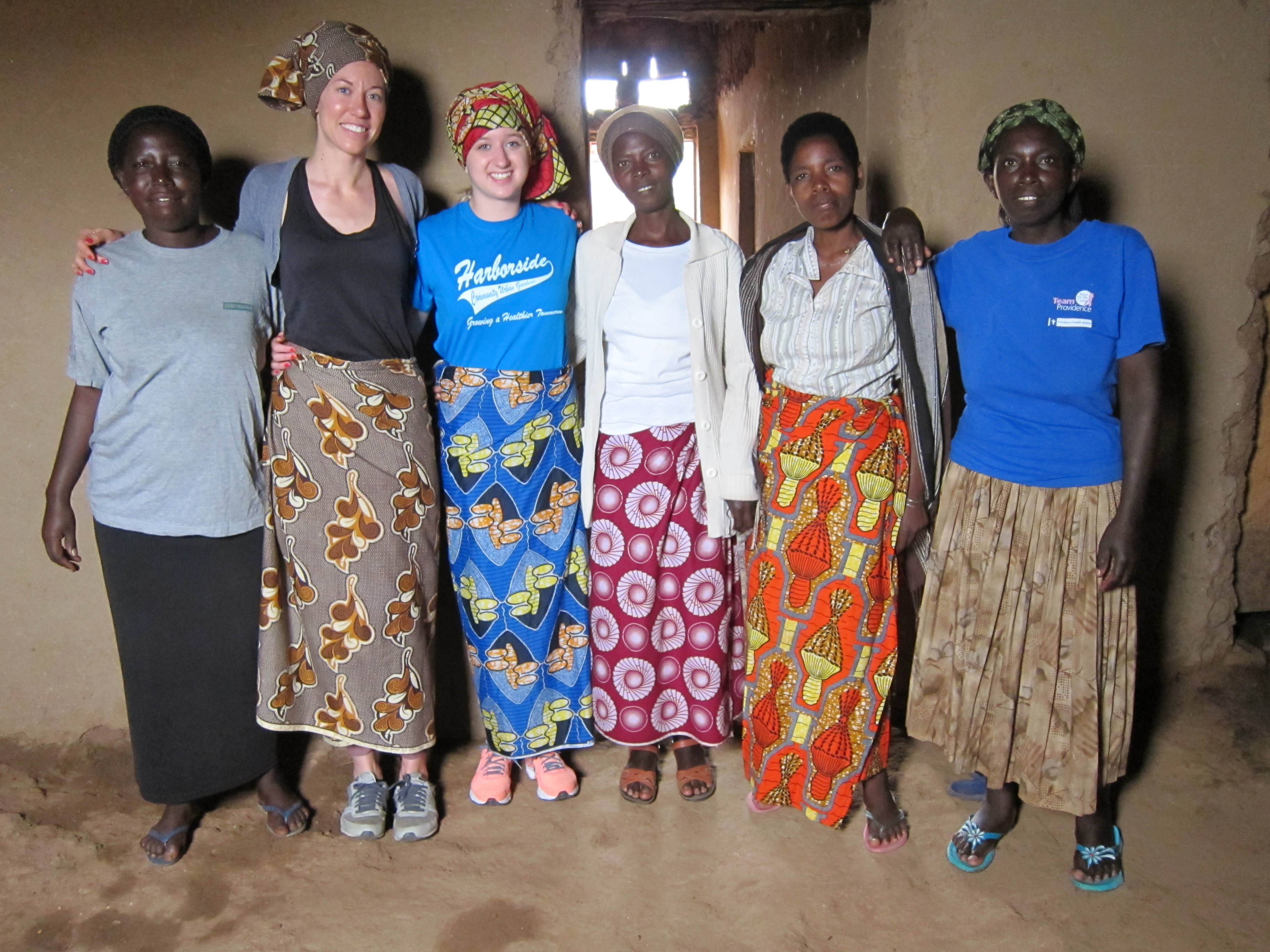 Harborside Senior Nicole with local women in Rwanda during her senior project